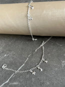 Pulseira estrela e lua infantil